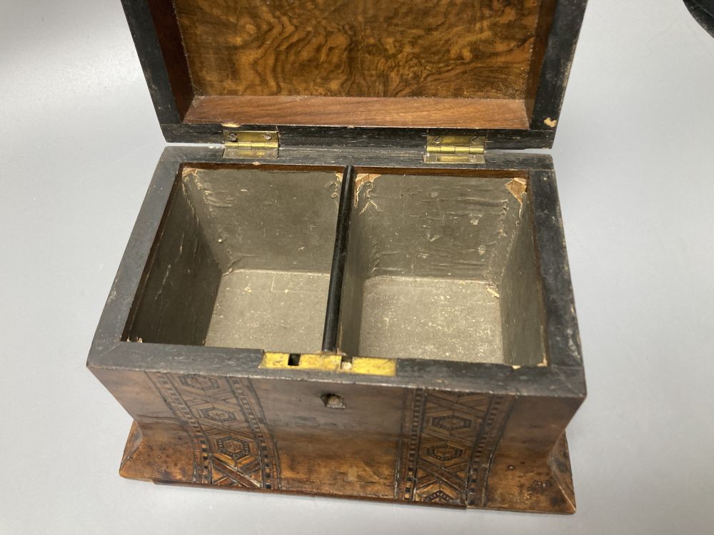 An Edwardian inlaid mahogany writing box, with hinged folding slope and fittings, 29cm, and a Victorian walnut and parquetry tea caddy,